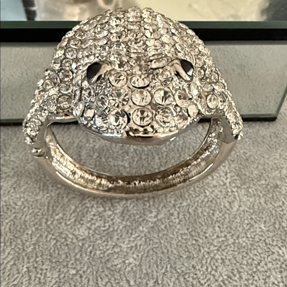 Hinged frog clamper bracelet featuring rhinestone embellishments